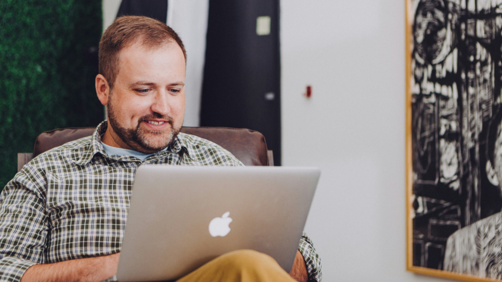 How Fintech Is Shaping Consumer Credit Access in 2025. https://unsplash.com/photos/man-smiling-and-using-macbook-qnt9iigV444