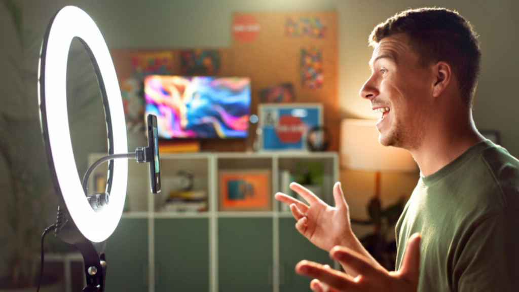 How Social Media Creators Can Maximize Exposure With Views. https://www.freepik.com/premium-photo/influencer-ring-light-talking-phone-streaming-follower-interaction-content-creation-man-gamer-mobile-home-subscriber-engagement-storytelling-connectivity-profile_378814287.htm#fromView=search&page=1&position=13&uuid=8a72ad53-16ed-4b7e-bb69-f004930eedec&query=How+Social+Media+Creators+Can+Maximize+Exposure+With+Views