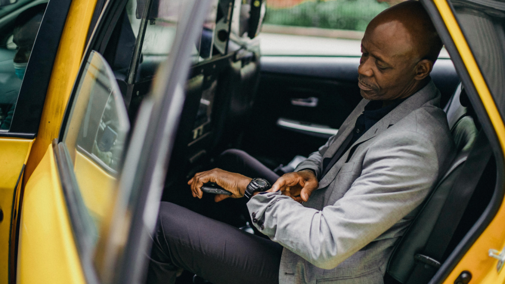 Smart Ways to Prepare for Delays, Cancellations, and Detours https://www.pexels.com/photo/serious-black-businessman-checking-time-on-wristwatch-in-taxi-5647605/