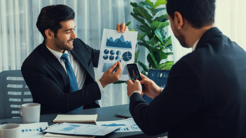 How Supply Chain Planning Software Reduces Delays https://www.freepik.com/premium-photo/two-men-suits-sit-desk-one-them-is-holding-chart-other-is-looking-graph_44810729.htm#fromView=search&page=1&position=2&uuid=fa5bc120-f13f-4696-8f70-afd648579b99&query=Understanding+Strategic+Financial+Management+in+Business