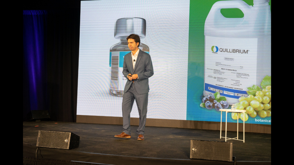 Gaston Salinas, CEO Botanical Solution Inc. (BSI) speaking about development of QS-21 adjuvant for vaccines from Quillaja saponaria trees grown in BSI labs (Image Courtesy: Botanical Solutions Inc.)