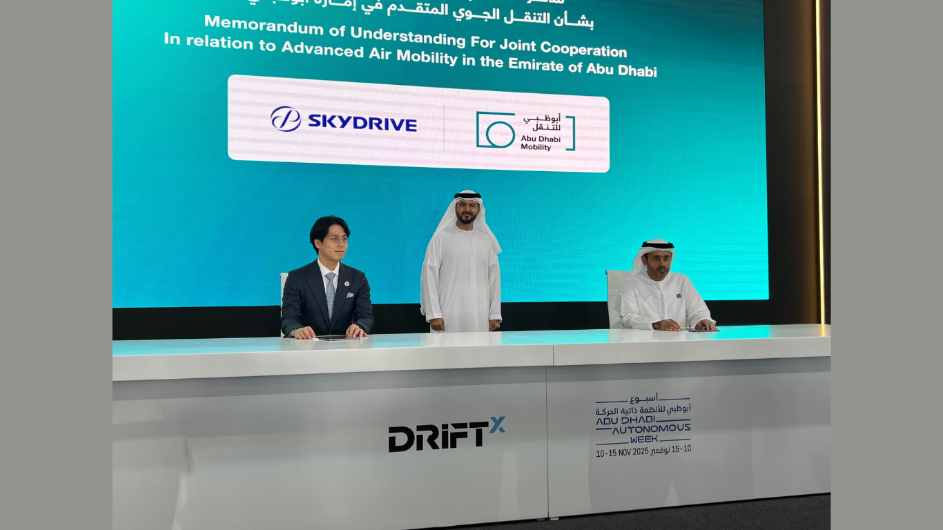 Right: Dr.Abdulla Hamad AlGhfeli, Acting Director General of the Integrated Transport Centre (ITC) / Center; His Excellency, Dr. Saif Al Nasri, Undersecretary of the Department of Municipalities and Transport/Left: Takehiko Sato, Chief Strategy Officer, SkyDrive. The signing ceremony was held at "DRIFTx," an automotive and mobility event held in Abu Dhabi on November 11, 2025 (Image Courtesy: Business Wire)
