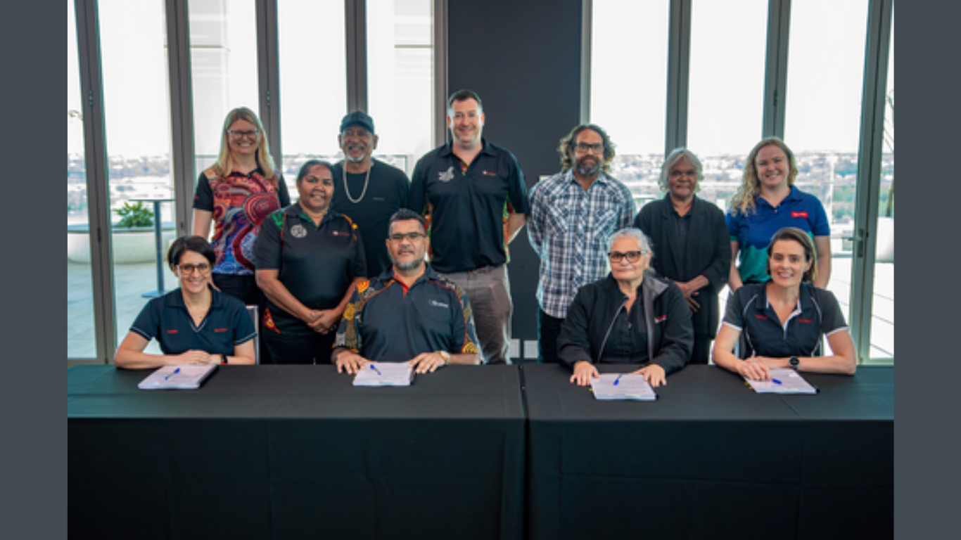 Yinhawangka Aboriginal Corporation and Rio Tinto representatives sign Interim Modernised Agreement (Image Courtesy: Business Wire)