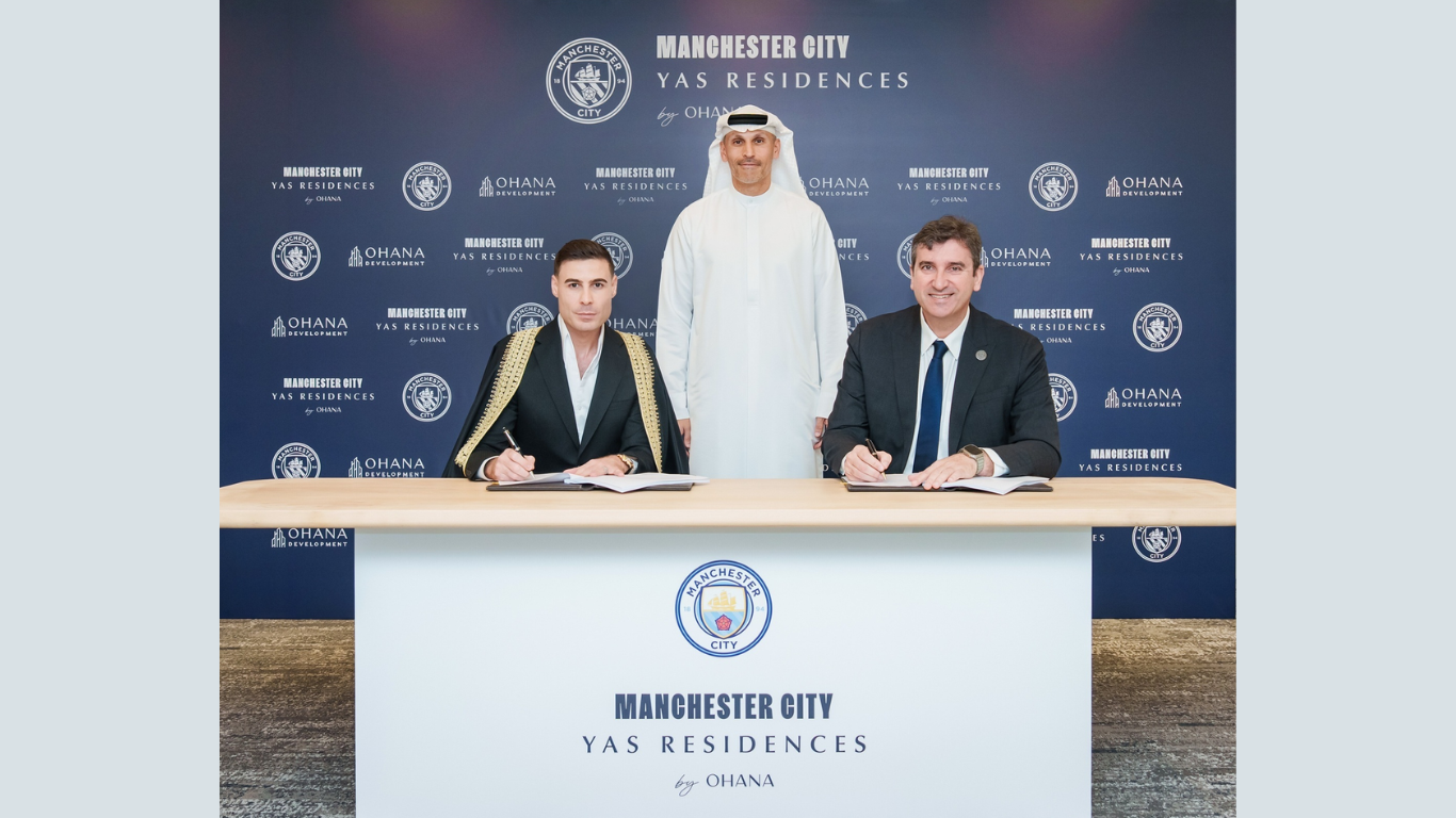 Standing: HE Khaldoon Al Mubarak, Chairman of Manchester City Football Club. Left to right: Husein Salem, CEO of Ohana Development and Ferran Soriano, CEO of City Football Group (Image Courtesy: Business Wire)