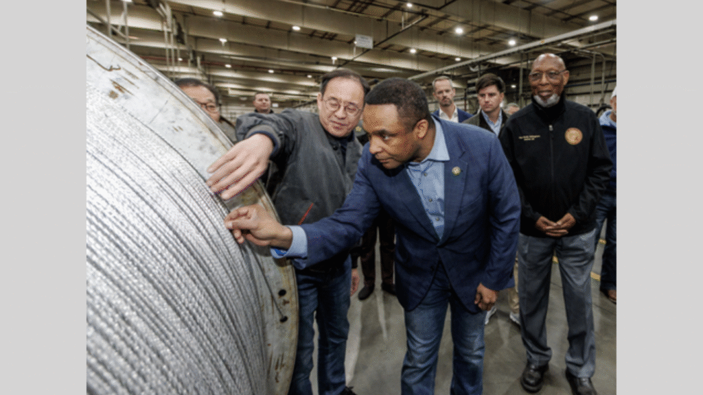 U.S. Congressman Don Davis and Gisu Kim, Regional President of North America, LS Cable & System (Image Courtesy: Business Wire)