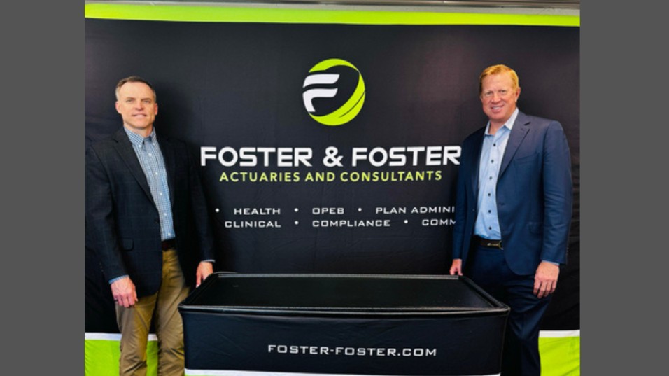 Pictured left to right: United Actuarial Services CEO Hans Kraabel & Foster & Foster CEO Brad Heinrichs (Business Wire)