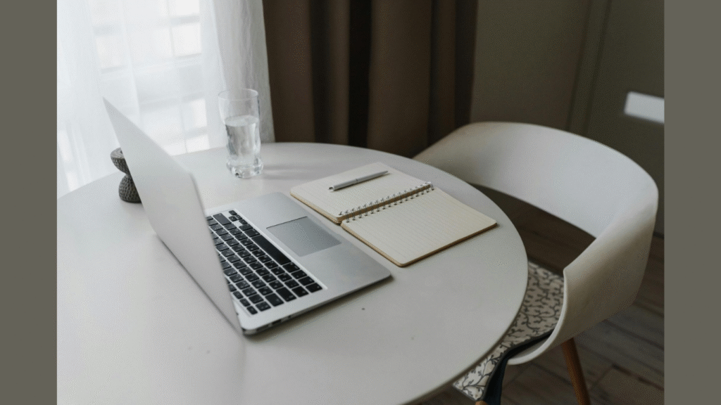 Essential Mailroom Management Products for Modern Businesses (Image credit: https://www.pexels.com/photo/laptop-and-notebook-on-top-of-a-round-table-5712537/)