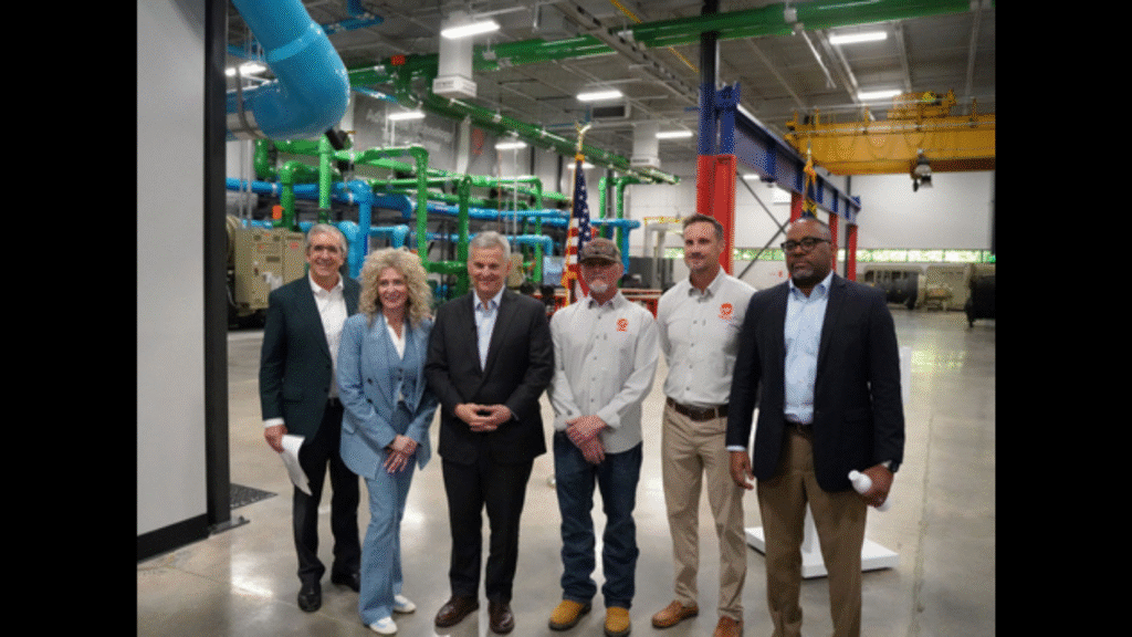From Left to Right: Dave Regnery, Chair and CEO, Trane Technologies; Holly Paeper, President, Commercial HVAC Americas, Trane Technologies; Governor Josh Stein (D-North Carolina); Jeff “Cledus” Payne, Technician Training Leader, Trane Technologies; AJ Drury, Digital Training Leader, Trane Technologies; Marlon Jones, Technician Experience Leader, Trane Technologies inside the Trane Advanced Technology Training Center (ATTC). (Image credit: Business Wire)