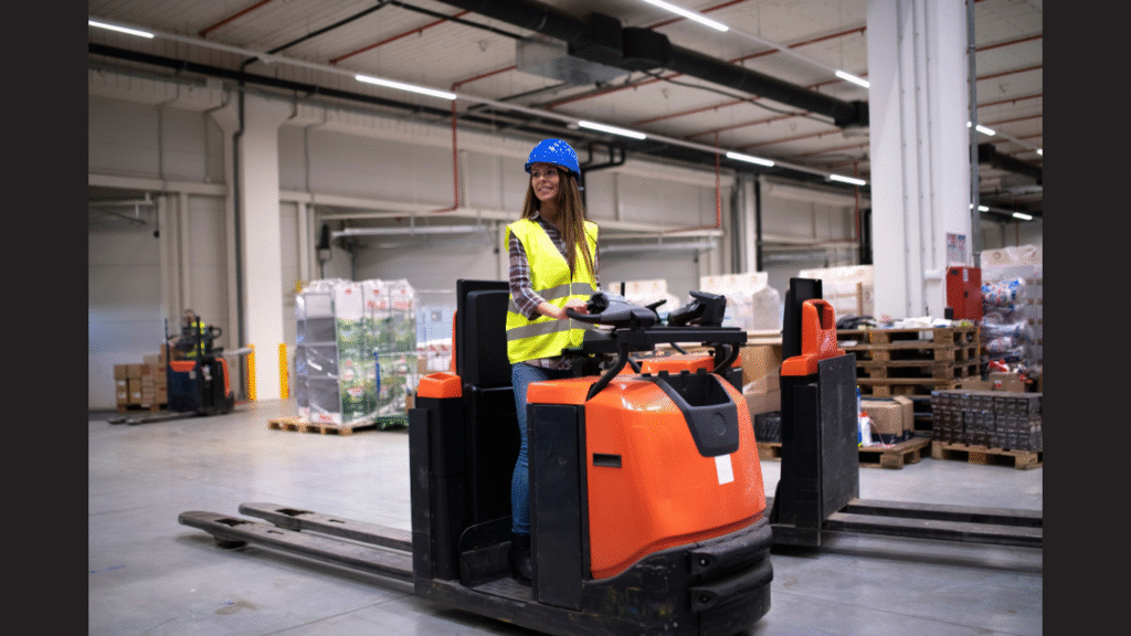 Factory worker in protective suit with hardhat driving forklift (Image credit: Magnific)
