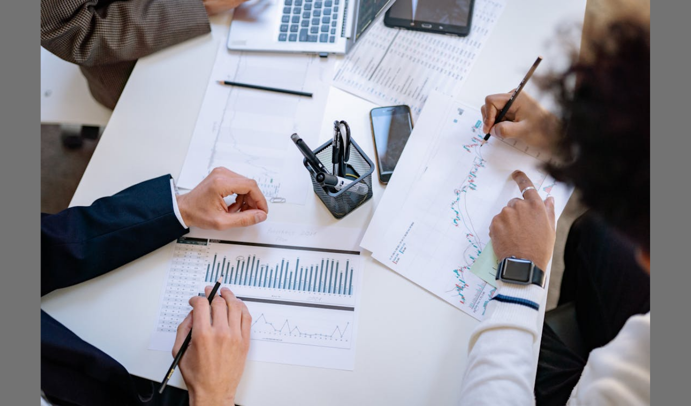 The UK and China Trade Deal: Can It Help the UK Activate Its Domestic Economy and Attract Overseas Businesses for a Relocation. (Image credit: https://www.pexels.com/photo/top-view-of-people-writing-on-papers-7698796/)