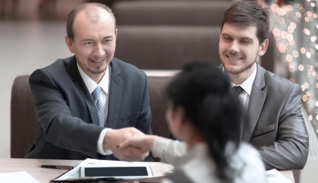Colony Bankcorp and First Reliance Merge to Expand Southeast Presence. https://www.magnific.com/premium-photo/handshake-manager-customer-modern-office_27767639.htm#fromView=image_search_similar&page=1&position=14&uuid=b8dc8270-20f9-4e83-819e-1caff592db0f&query=bank+managers+in+a+bank+sign+agreemnt