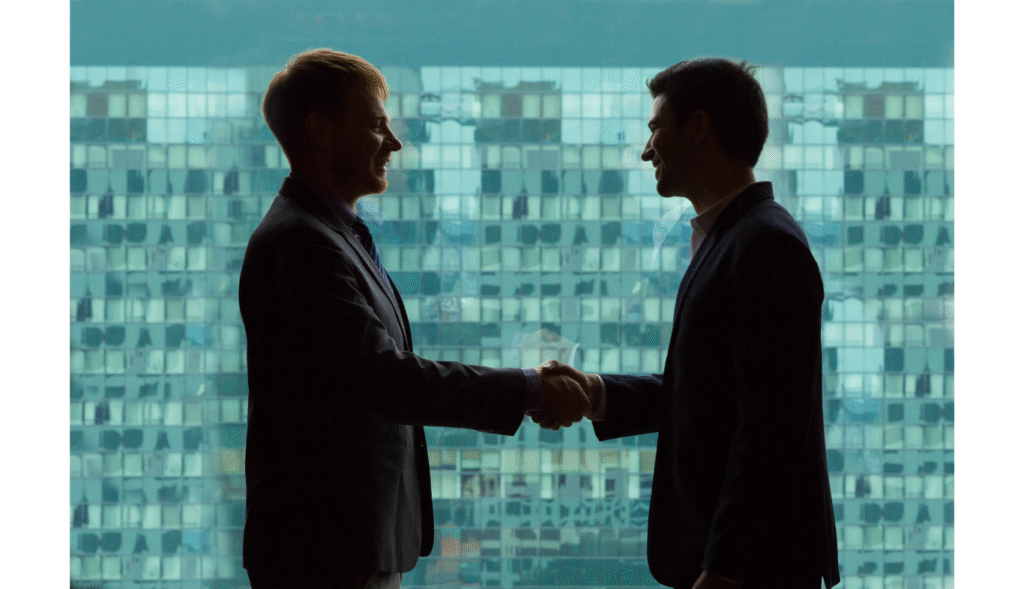 OKI Signs Strategic Partnership with Lazarus AI. https://downloadscdn6.magnific.com/1262/1/792.jpg?filename=business-people-shaking-hands-with-green-background-office-buildings.jpg&token=exp=1780987944~hmac=728378a838dbede9001683c78c3983dd&filename=792.jpg