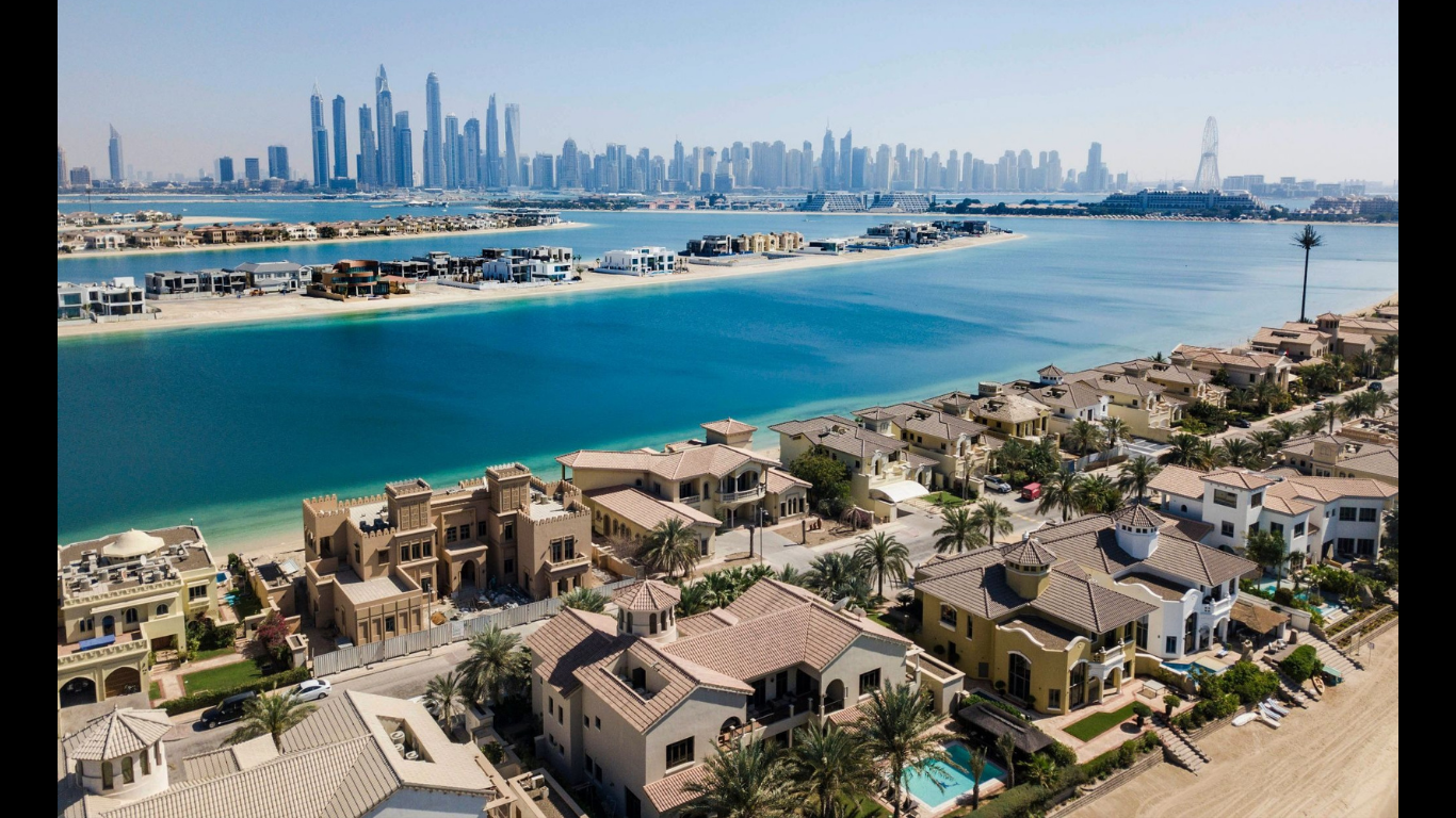 6 Luxury Real Estate Investment Strategies. (Image Source: https://www.pexels.com/photo/villas-in-front-of-skyscapers-in-dubai-10514386/)