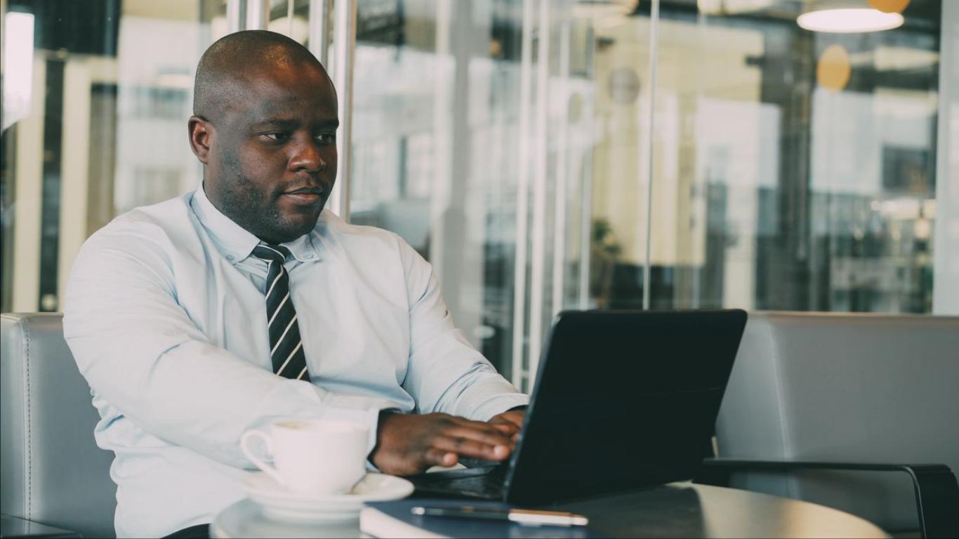 Ways Successful Entrepreneurs Invest in Their Own Development. (Image source: https://www.pexels.com/photo/professional-businessman-working-on-laptop-at-cafe-36766738/)