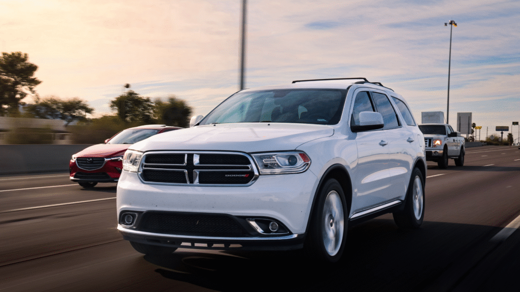 Dodge SUVs: 25 Years of Evolution. (Image Credit: https://www.pexels.com/photo/white-dodge-durango-on-street-20733767/)