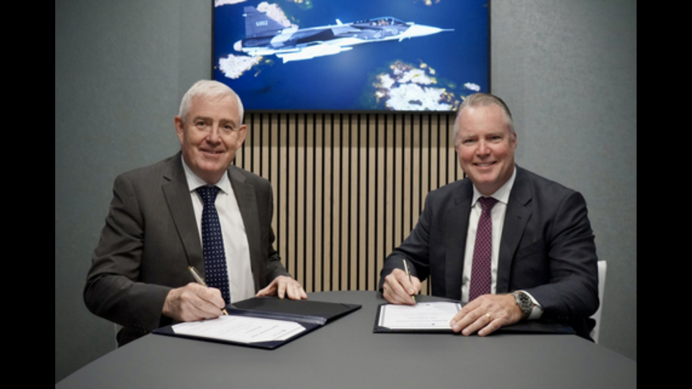(Left to right) Haydn Martin, Vice President, Business Development, Marketing, and Contracts, Magellan Aerospace, and Paul Ferraro, Vice President & General Manager, Defense Engines & Services, GE Aerospace, sign agreement at Farnborough Air Show. (Image Credit: Business Wire)