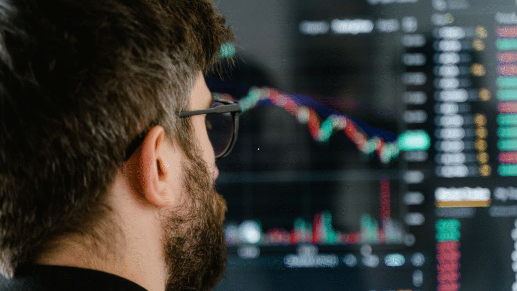 Key Factors Traders Evaluate Before Keeping Forex Positions Open Overnight. (Image source: https://www.pexels.com/photo/a-close-up-shot-of-a-bearded-man-wearing-eyeglasses-7567220/)