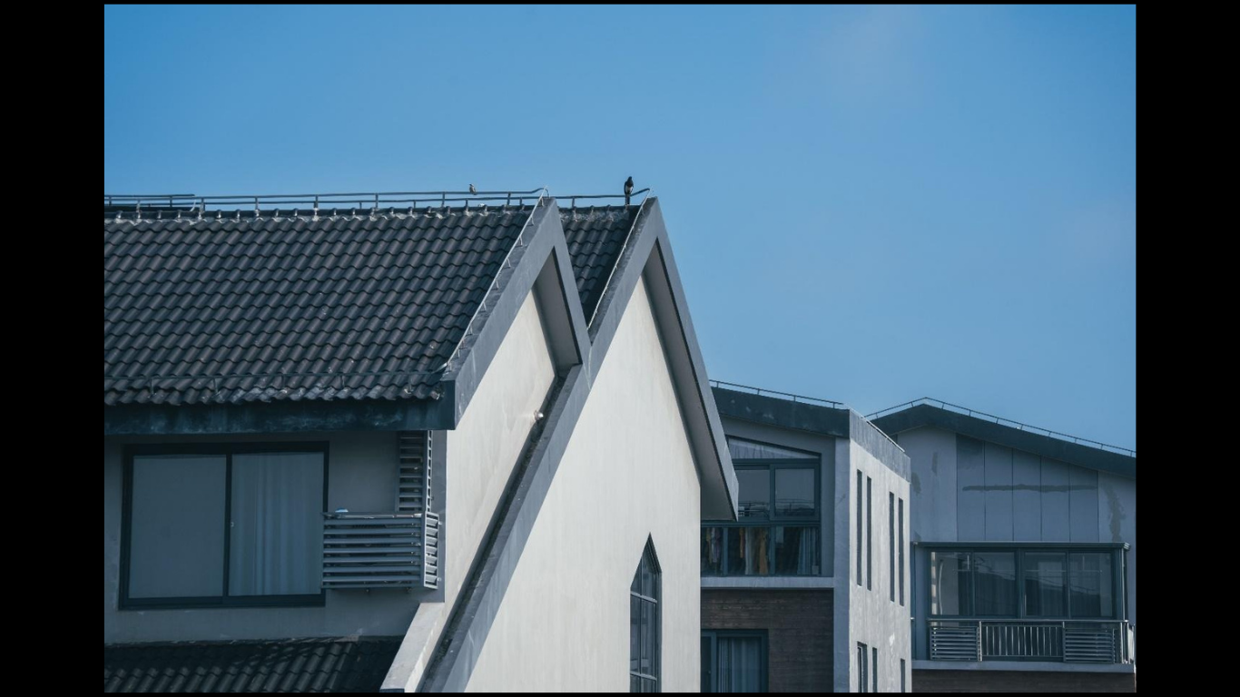 Commercial Roof Maintenance Strategy for Facilities. (IMAGE SOURCE: https://www.pexels.com/photo/modern-residential-architecture-under-clear-blue-sky-32788112/)