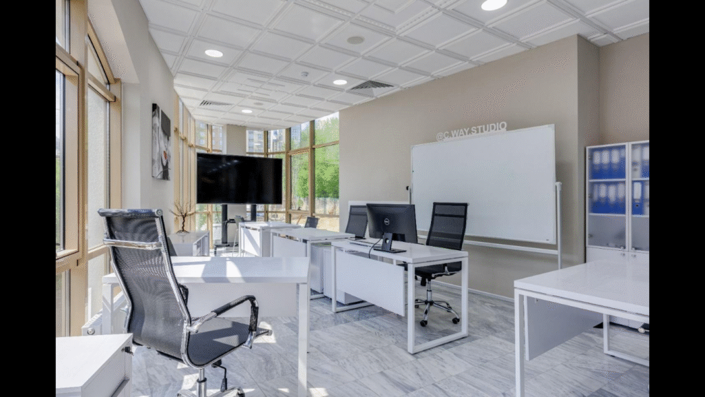 Exterior Improvements That Can Transform Your Office Building. ( IMAGE SOURCEhttps://www.pexels.com/photo/white-desks-and-swivel-chairs-in-the-office-7750129/)