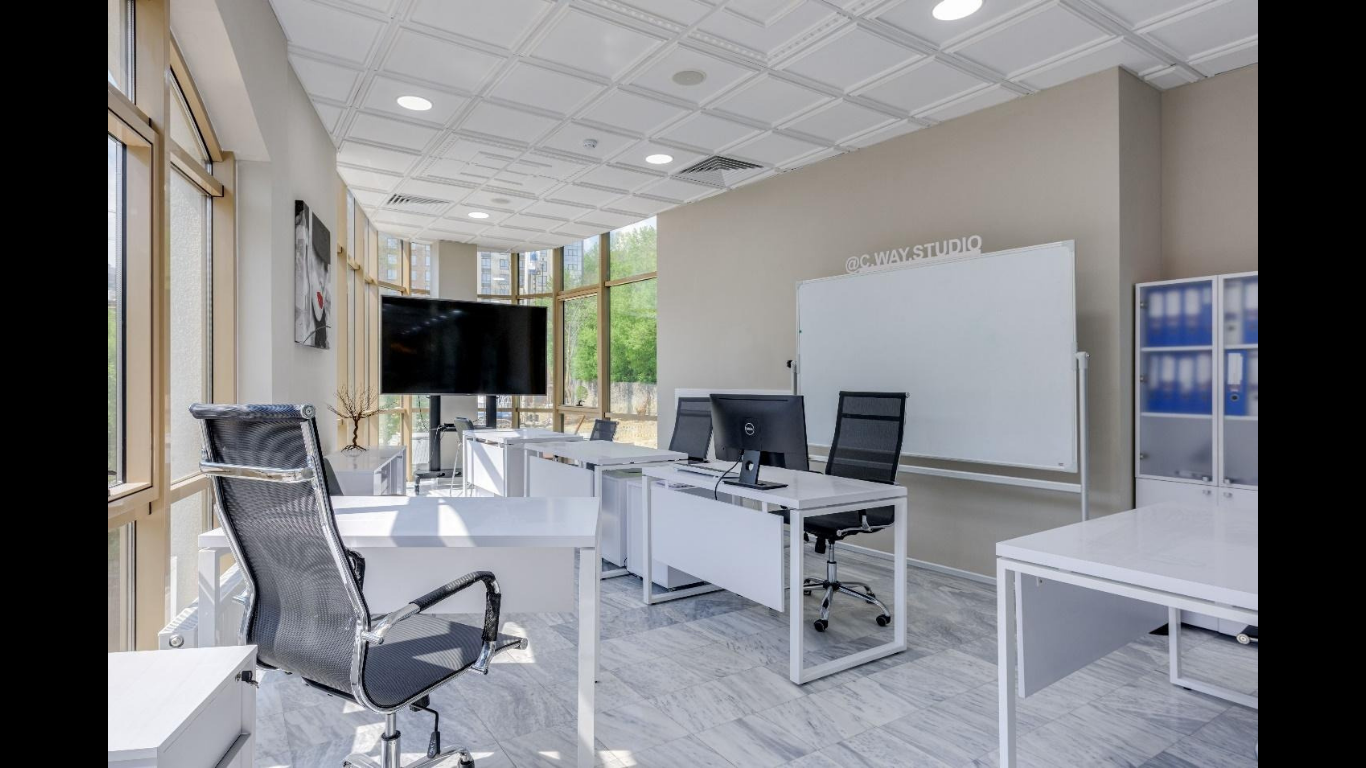 Exterior Improvements That Can Transform Your Office Building. ( IMAGE SOURCEhttps://www.pexels.com/photo/white-desks-and-swivel-chairs-in-the-office-7750129/)
