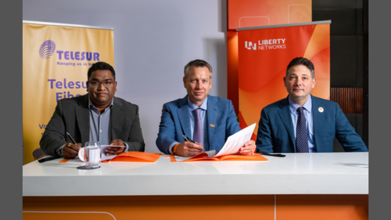 Doric Ramlakhan, CEO of TELESUR; Ray Collins, Liberty Latin America's SVP of Infrastructure and Corporate Strategy and CEO of Liberty Networks; and Carmine Sorrentino, VP & Chief Commercial Officer of Liberty Networks, during the signing of the MOU. (Image Credit: Business Wire)