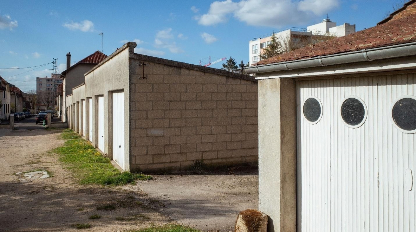 Garage Upgrades That Can Support Your Business. (IMAGE SOURCE: https://www.pexels.com/photo/urban-street-view-of-garages-in-compiegne-france-31406336/)